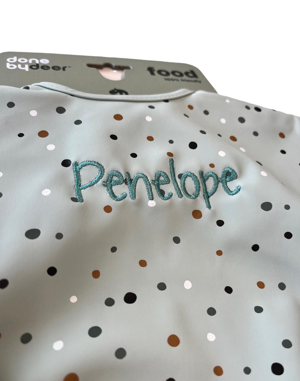 Sleeved pocket bib - happy dots - green - By done by deer